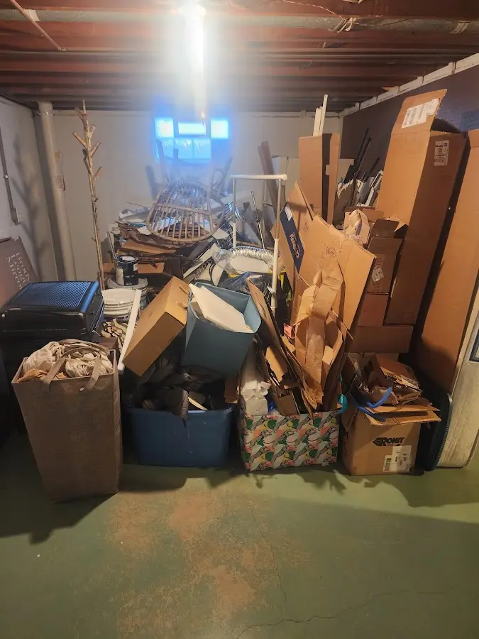 Roll-off dumpster container at job site for 6 Yard Dumpster Rental in Standish